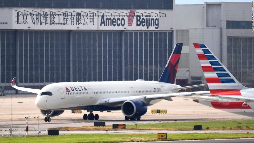 Major US airlines expand flight cancellations to China and Hong Kong – CNN