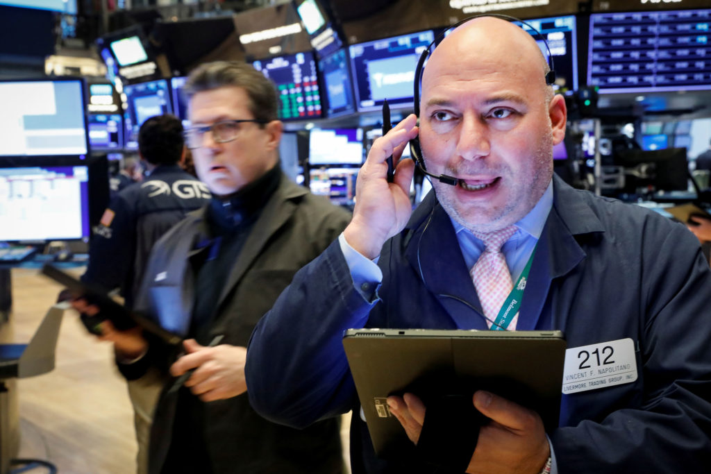 Stock market live updates: Surprise Fed rate cut, stocks volatile, Tesla jumps – CNBC