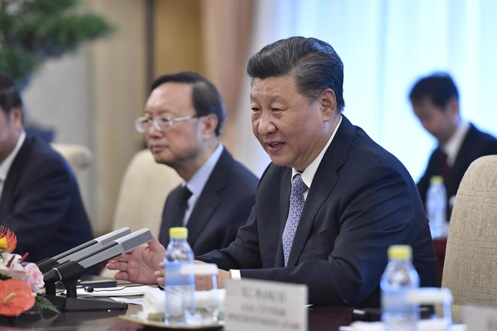 China’s Xi vows ‘reunification’ with Taiwan, but holds off threatening force