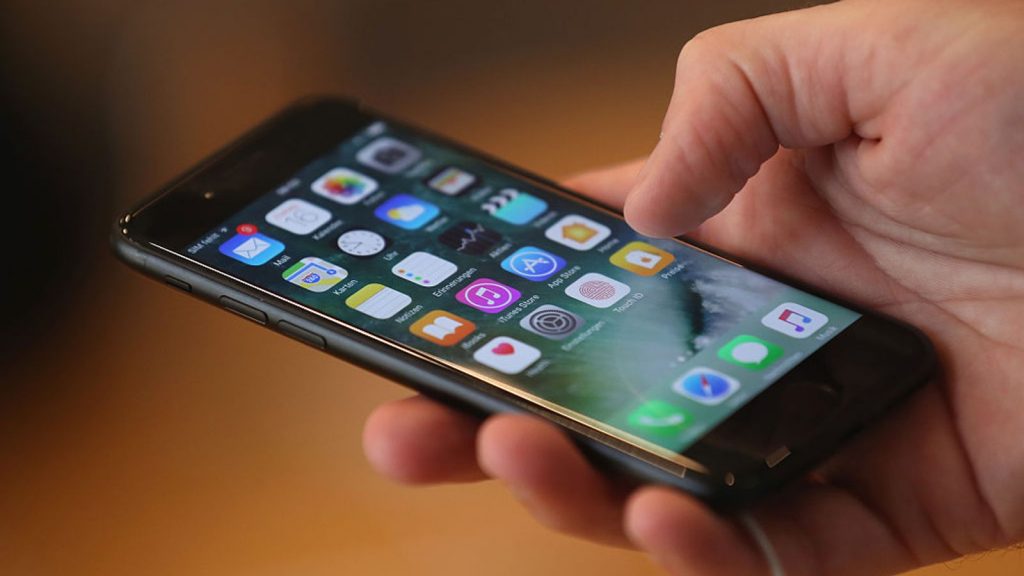 Apple to pay 3m settlement after admitting slowing down older iPhones – Sky News