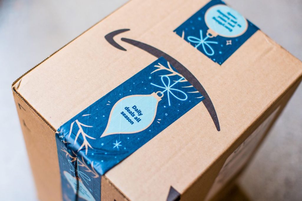 Amazon says 2020 holiday shopping season is its biggest yet – CNET