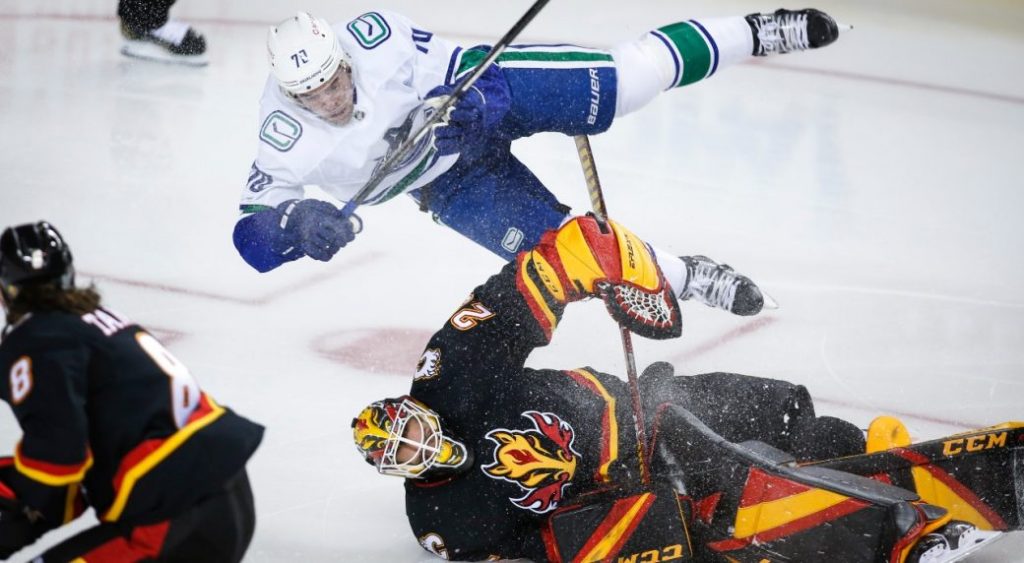 Markstrom finally falters as Canucks embarrass punchless Flames – Sportsnet.ca