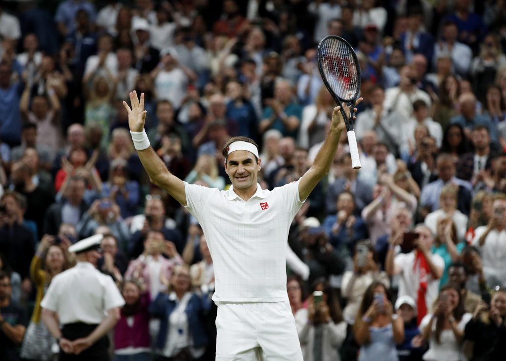 Golden oldie Federer through to 58th Grand Slam quarters