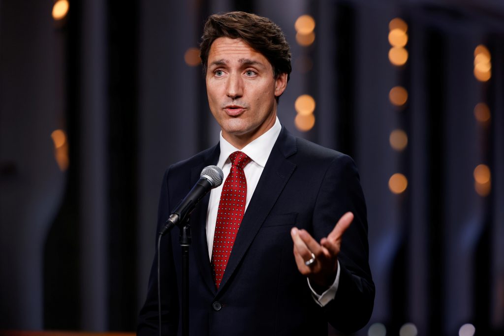 Trudeau, trailing in polls, defends early election call