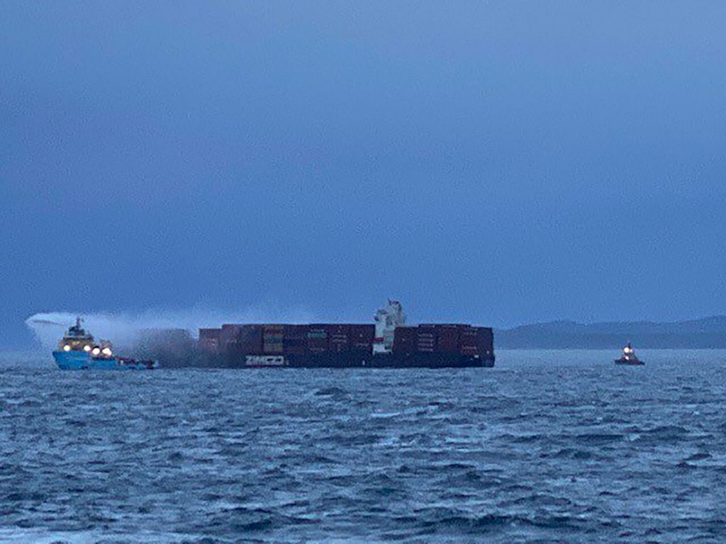 Bad weather off Canadian coast preventing efforts to board container ship after fire