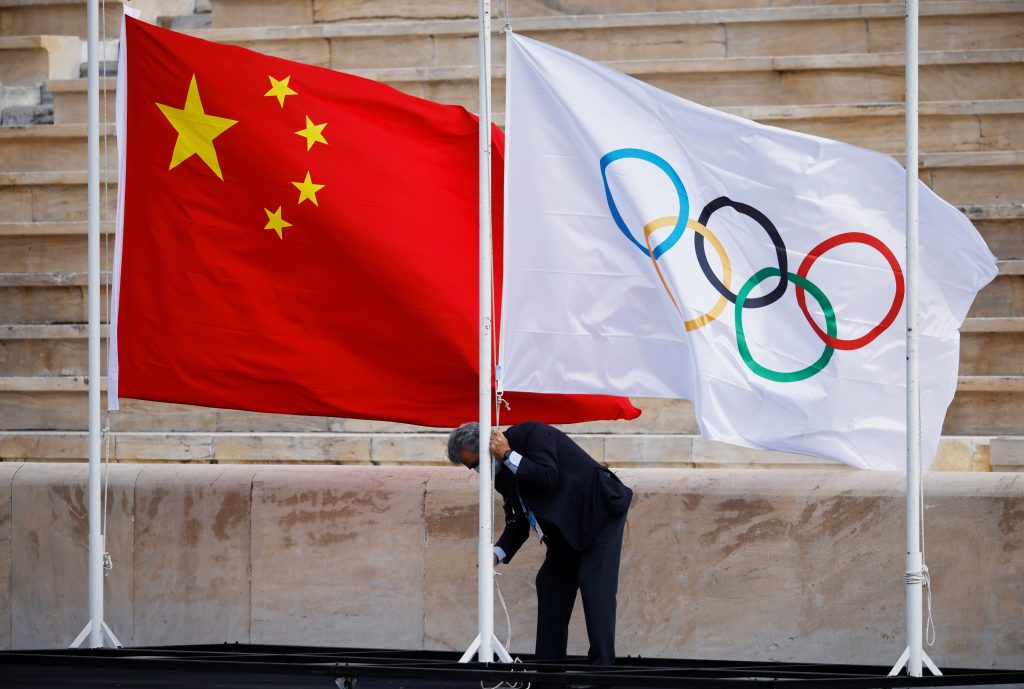 Beijing marks 100 days to Winter Olympics amid COVID, rights concerns