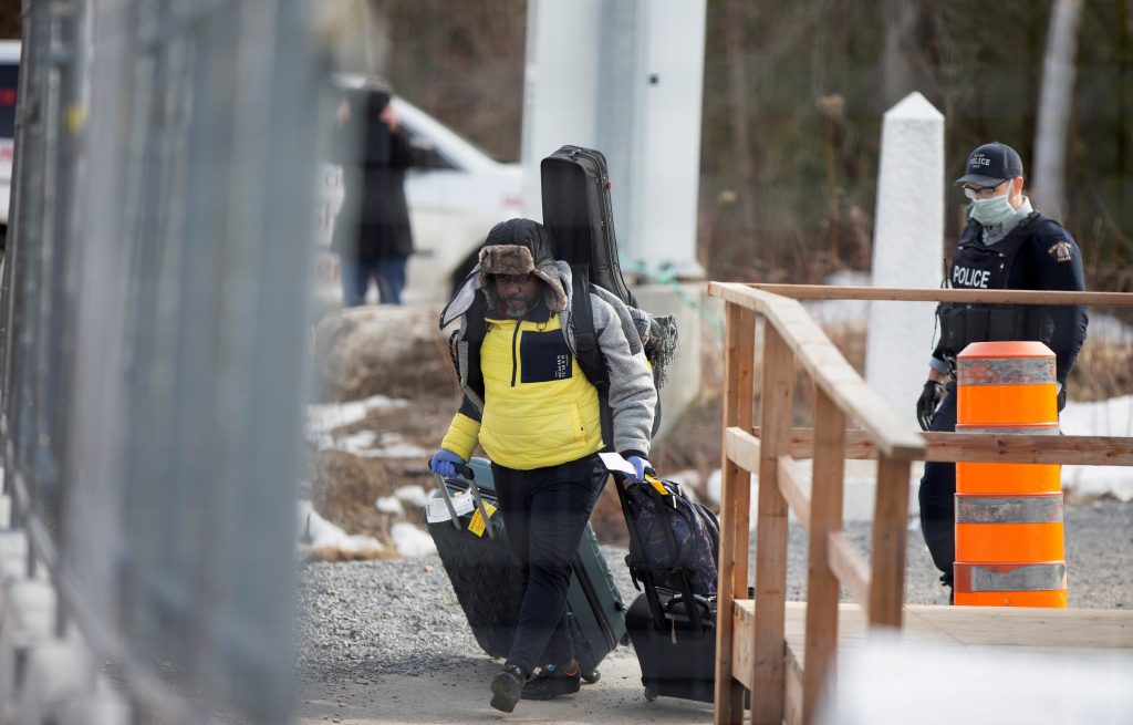Canada defends pandemic policy on asylum-seekers while letting more enter through exemptions