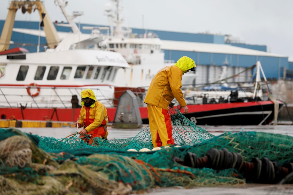Britain steps up post-Brexit dispute with France over fishing