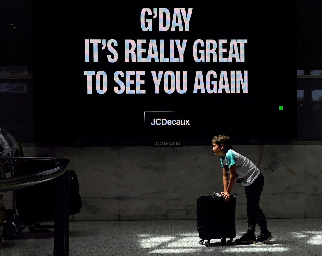 Australia to reopen to foreign visa holders in bid to revive economy