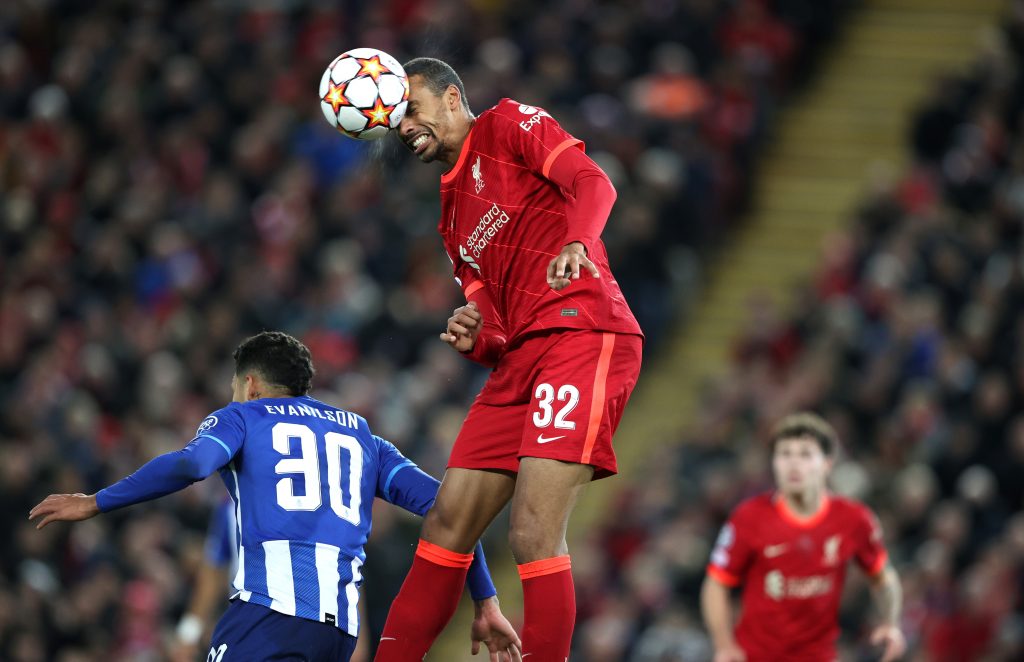 Soccer-Liverpool maintain perfect record with 2-0 win over Porto