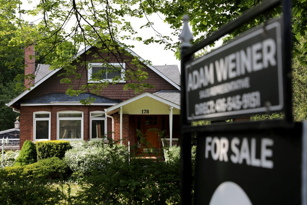 Red-hot Canadian property market to lose some steam in 2022: Reuters poll