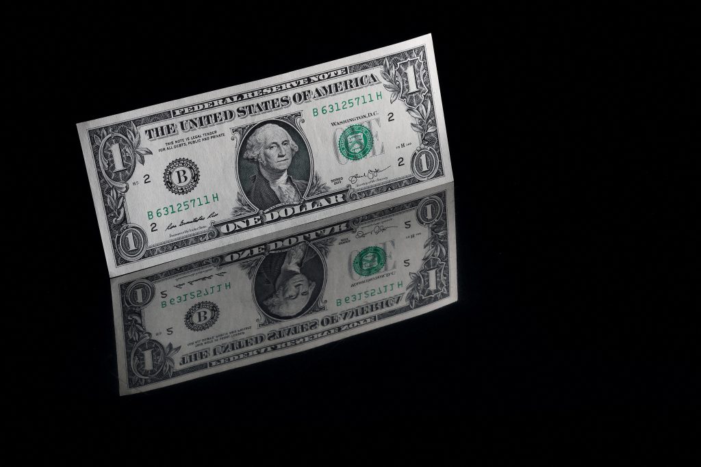 Dollar holds firm as investors eye major Fed policy meeting