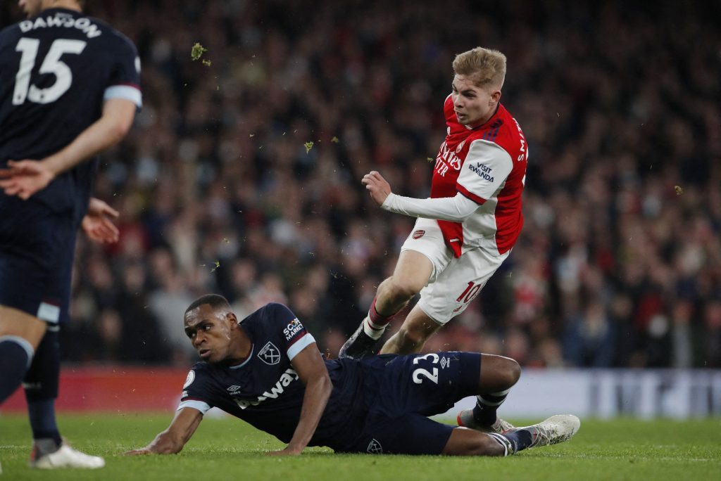 Soccer-Arsenal knock West Ham out of top four with derby win