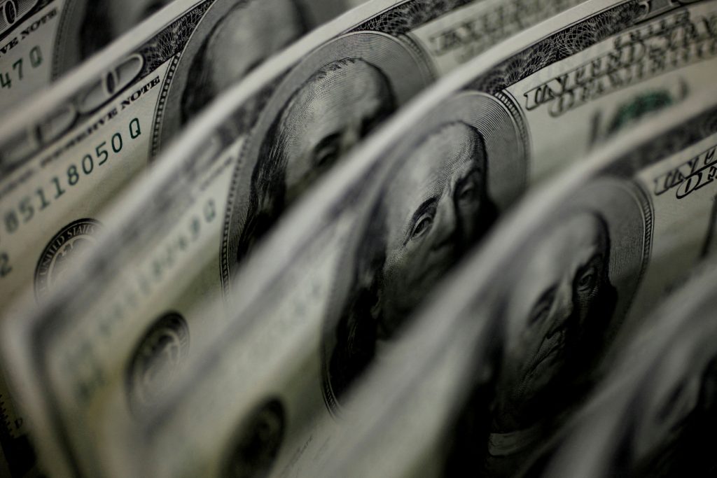 Dollar shines, euro droops as Omicron spreads while Fed hawks circle