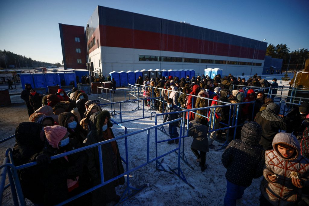 Migrants camped in Belarus warehouse still hope to get to EU