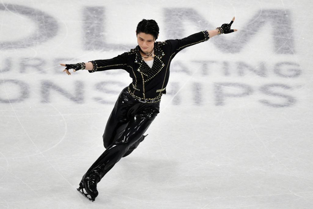 Figure skating-Hanyu seals Olympic berth with Japan championships win