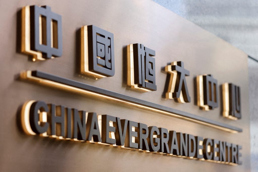 China Evergrande shares fall after missing new coupon payments