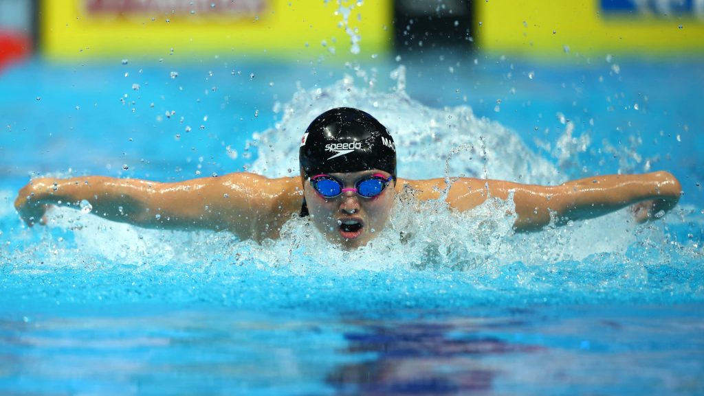 Maggie Mac Neil captures women's 100m butterfly gold, sets Canadian record at short-course worlds – CBC.ca