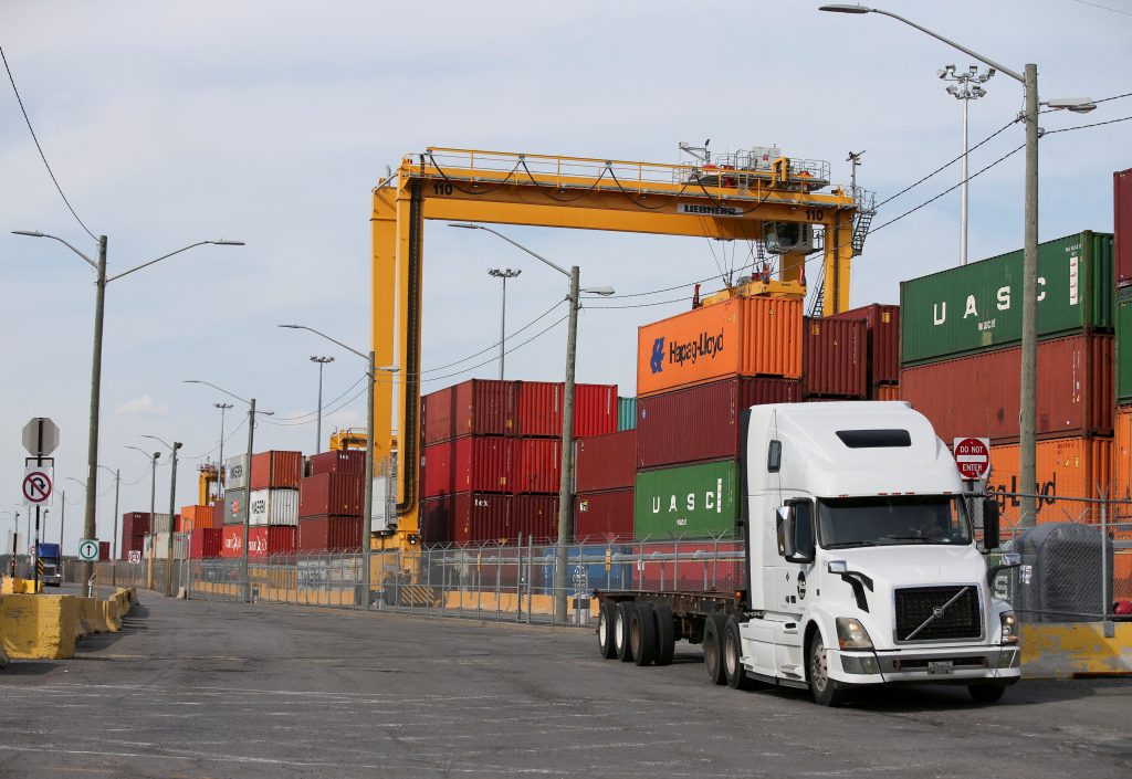 Canada posts biggest trade surplus for 13 years, exports offset flood impact