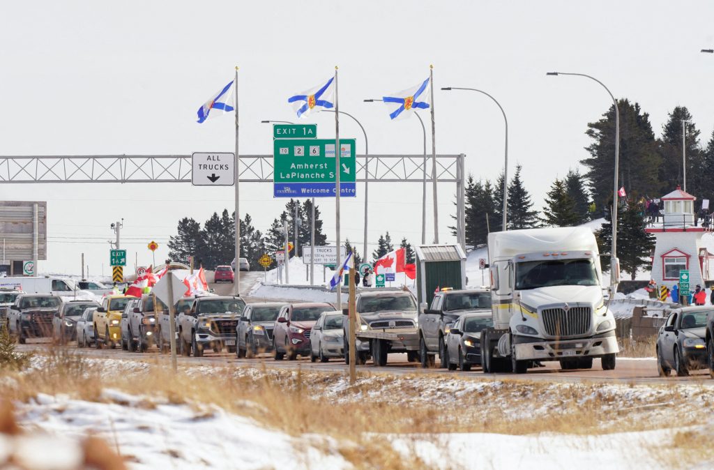 Truckers fighting government vaccine mandate march to Canadian capital