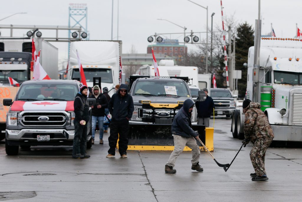 U.S. and Canada warn of economic hit from trucker protest