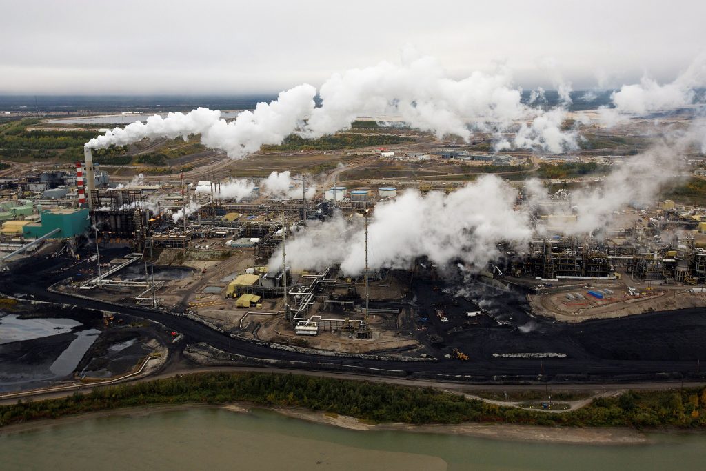 Exclusive-Alberta to toughen oil sands emissions standards that reward big Canadian polluters
