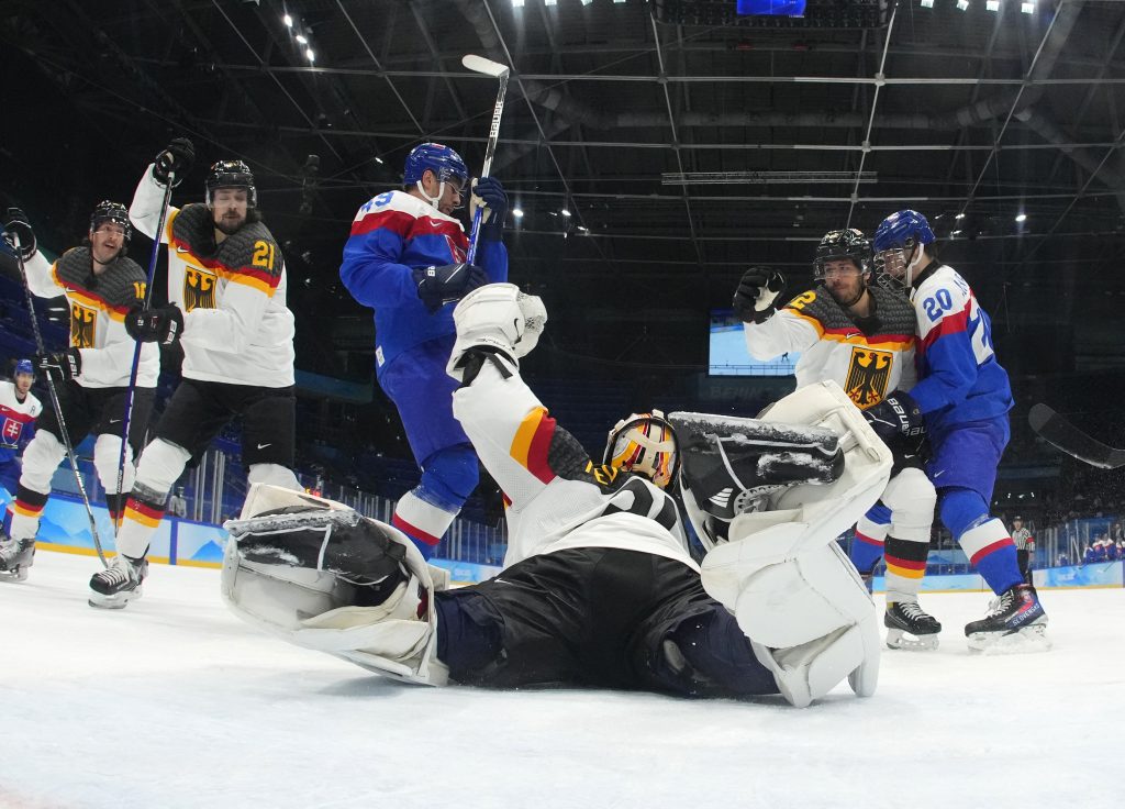 Olympics-Ice hockey-Germany out, debutant Denmark, Canada reach men’s quarter-finals