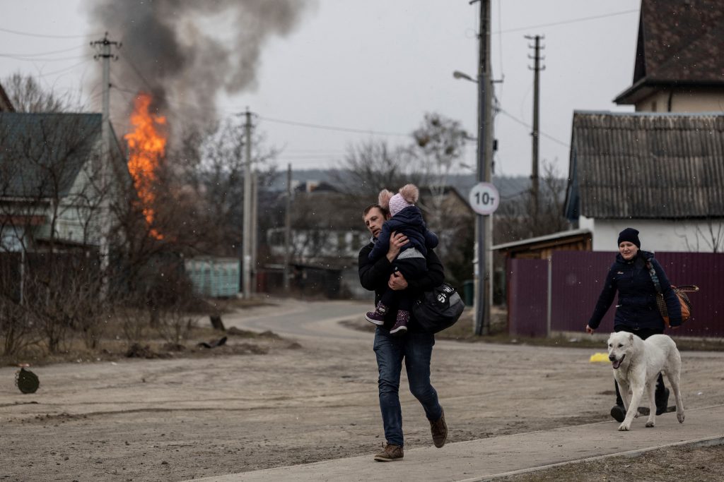 Residents fleeing town near Kyiv caught in shelling