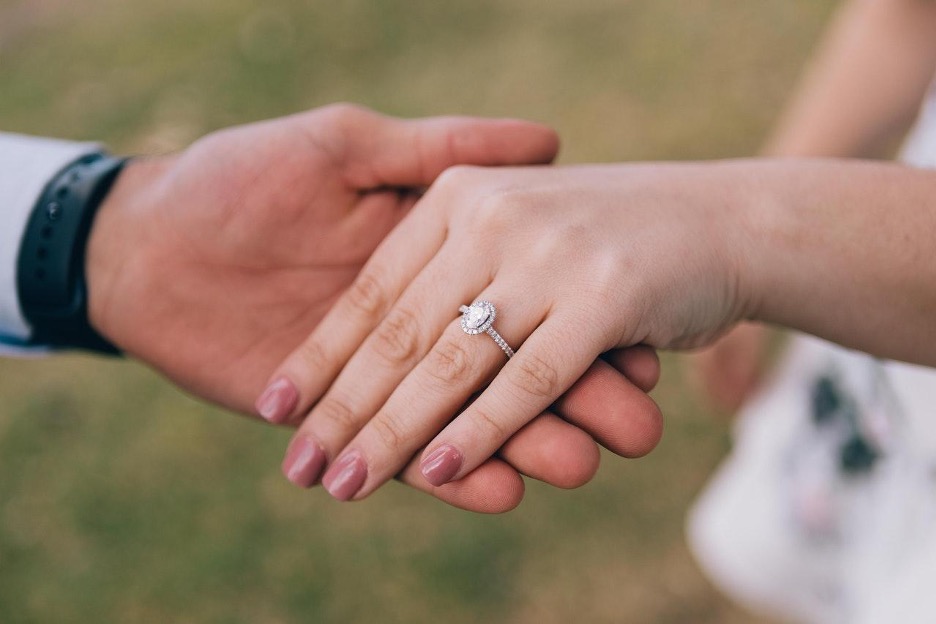 Couple holding hands with woman Pick Your Diamond