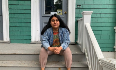 Stacey Gomez is pictured in front of her building, where she has lived since December 4, 2017.