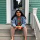 Stacey Gomez is pictured in front of her building, where she has lived since December 4, 2017.