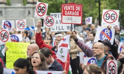 Judge suspends two articles of Quebec’s new language law, citing access to justice