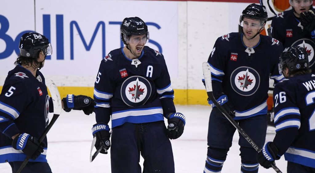 Jets score three goals in third period to complete comeback win over Ducks