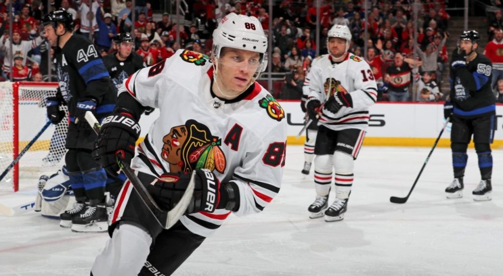 Kane notches hat trick, lowly Blackhawks beat Maple Leafs