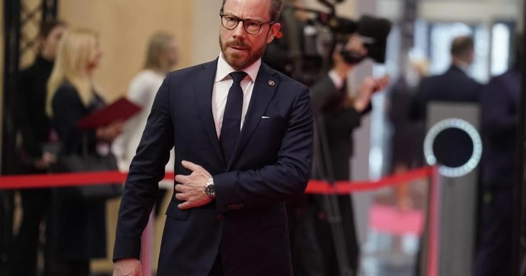 Danish deputy prime minister leaves politics, but his party stays on in the coalition government