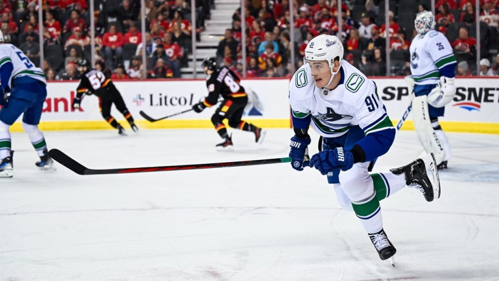 Canucks Beat Flames in Saddledome Rumble, Zadorov Earns First Point as a Canuck | Vancouver Canucks