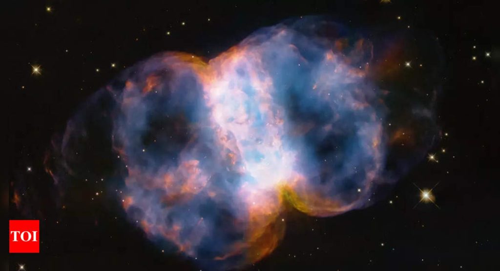 Nasa's Hubble marks 34th anniversary with stunning view of Little Dumbbell Nebula – The Times of India