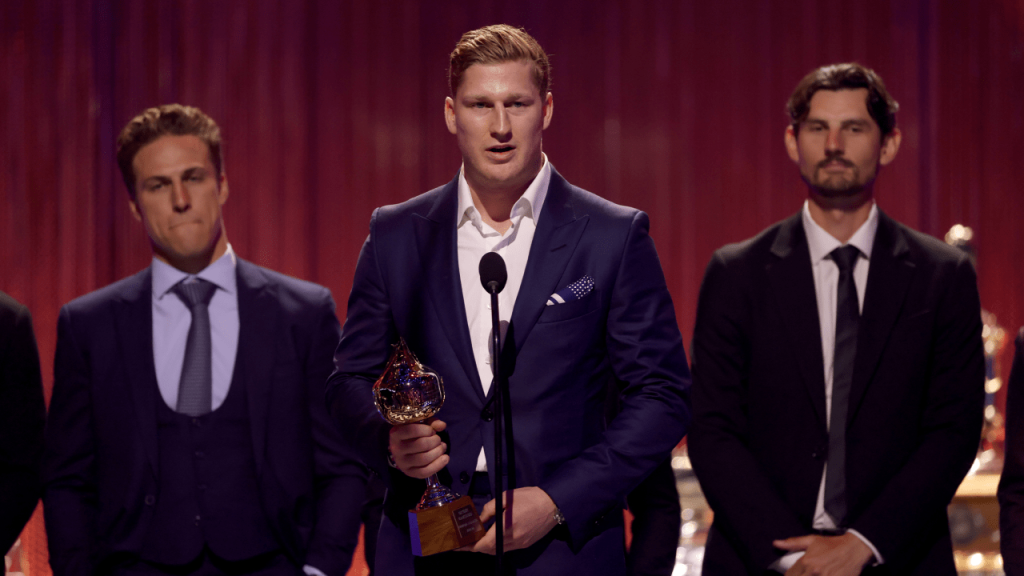 MacKinnon meets all definitions, wins both Hart Trophy, Lindsay Award