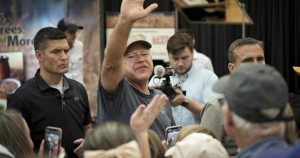 It’s a pork chop on a stick and a vanilla shake for Tim Walz at the Minnesota State Fair