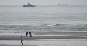 Migrant boat seen trying to make an apparent crossing of English Channel a day after 12 people died