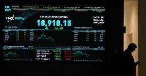 S&P/TSX composite edges lower in late-morning trading, U.S. stocks higher