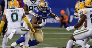 Surging Blue Bombers blitz Elks 55-27, clinch playoff spot Surging Blue Bombers blitz Elks 55-27, clinch playoff spot