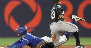 Myers drives in five runs, Marlins limit Blue Jays to four hits in 8-1 romp Myers drives in five runs, Marlins limit Blue Jays to four hits in 8-1 romp