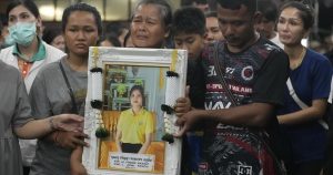 Memories and prayers are shared at a small-town funeral for the victims of horrific Thai bus fire