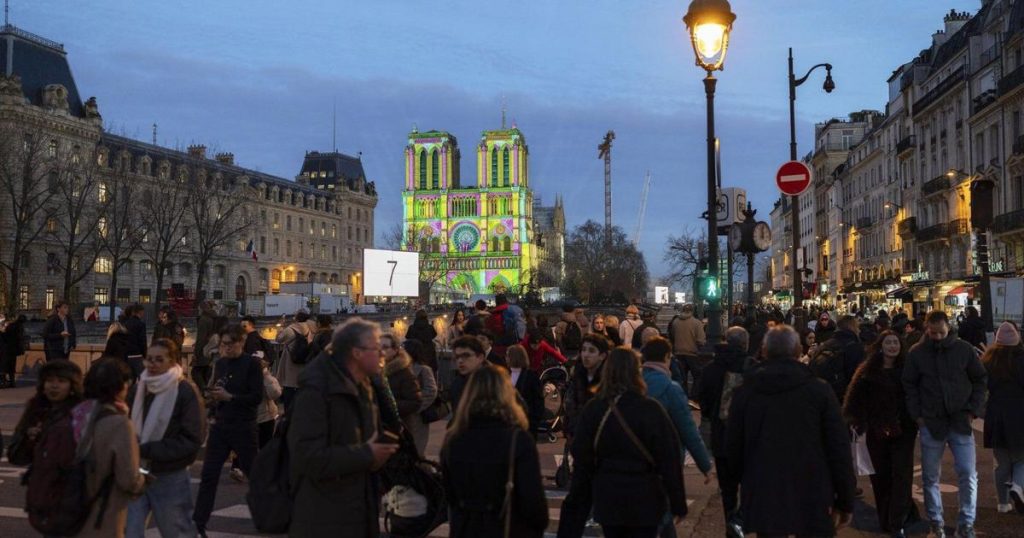 The Latest: The famed Notre Dame Cathedral in Paris reopens to great fanfare