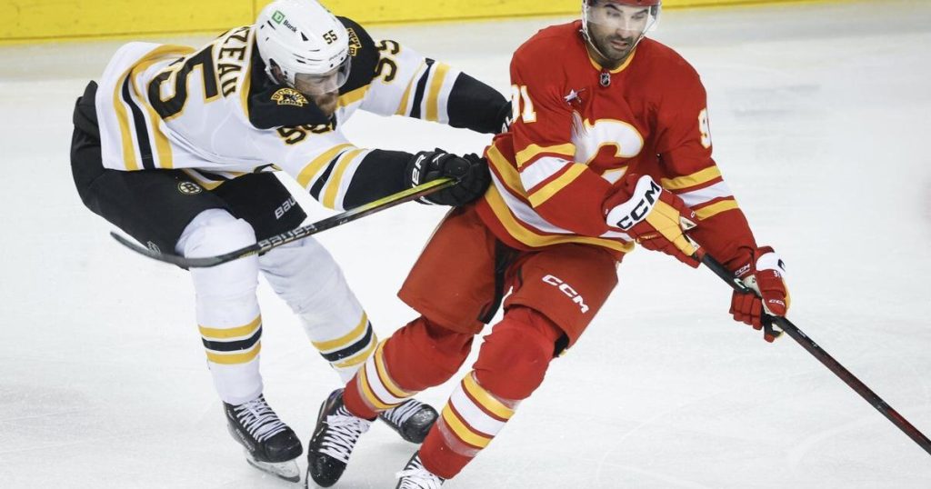 Pastrnak scores in OT as Bruins rally to beat Flames 4-3