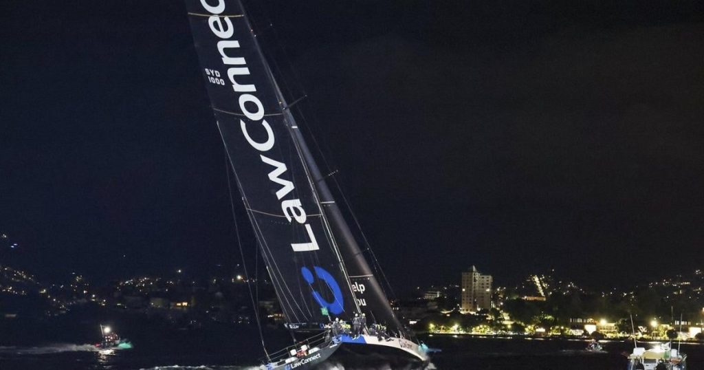 2 sailor deaths result in muted celebrations on winning yacht in Sydney to Hobart race