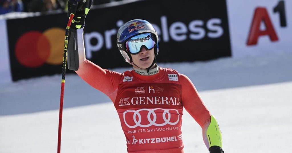 Swiss skier Marco Odermatt takes eventful World Cup super-G for 1st win in Kitzbuehel