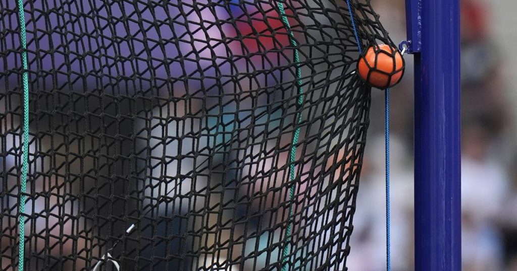 Man killed by stray weight at Colorado track and field meet remembered as dedicated husband, dad