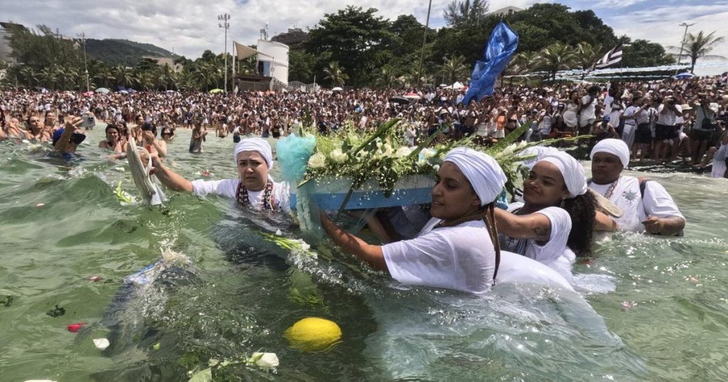 Devotees pay homage to Afro-Brazilian sea goddess on Rio de Janeiro beach